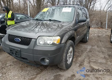 2006 Ford Escape Hybrid z USA, uszkodzony, nr VIN 1FMCU95H96KC44338